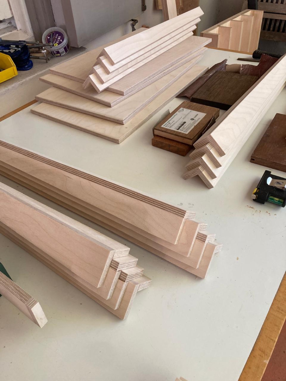 Precision-cut birch ply components on the workbench