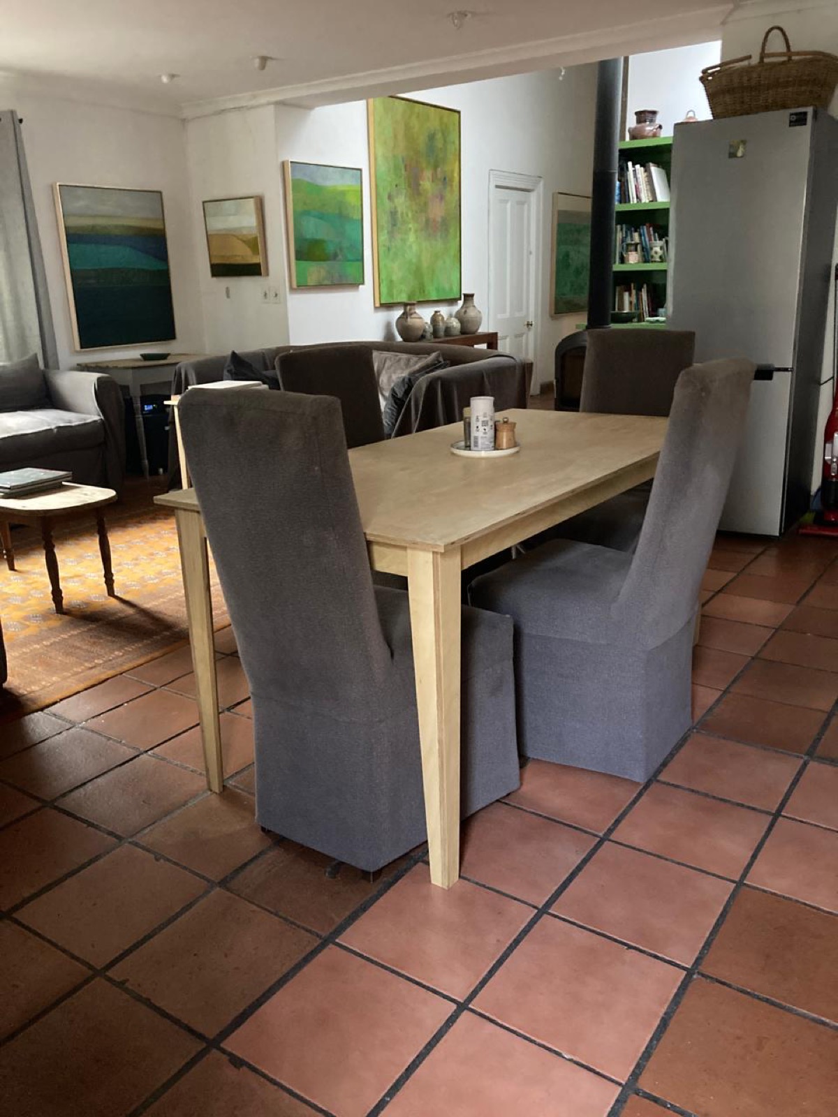 A blond birch table at home in a Cape Town living room
